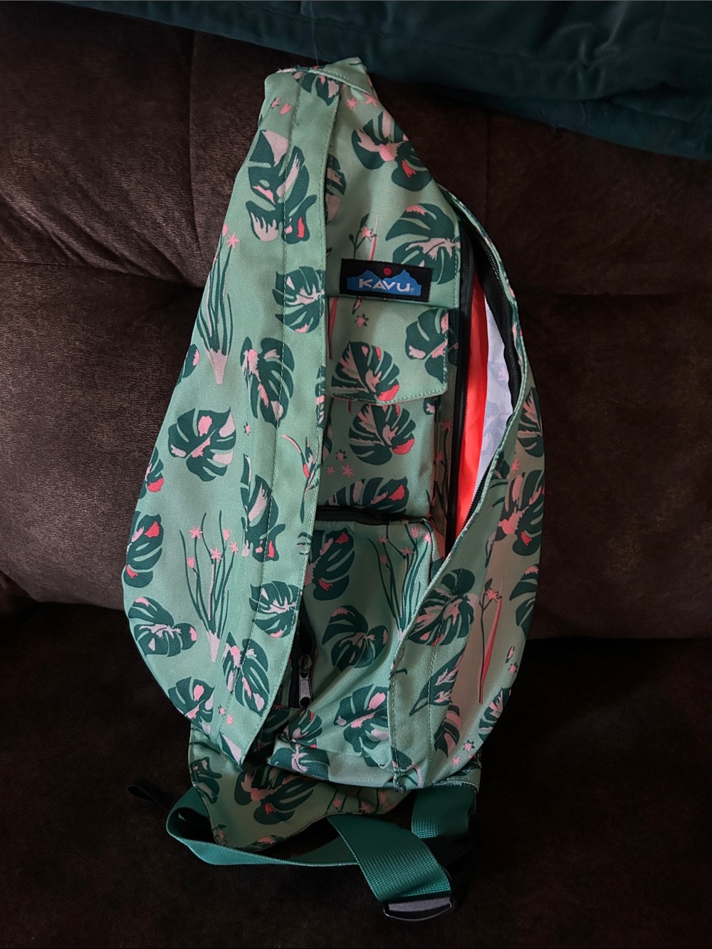 Kavu Green Tropical Print Sling Bag with Pink Accents